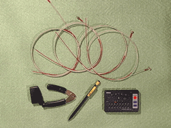 New strings, winder, cutter, pencil, tuner